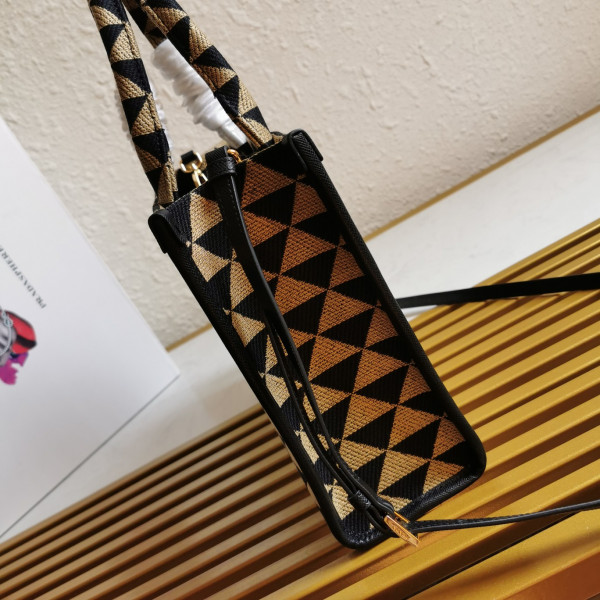 Pra*a small symbole jacquard fabric handbag