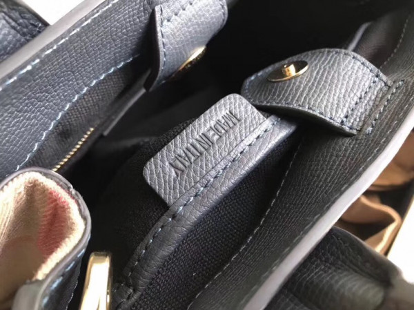 B**rry the small banner in leather and house check