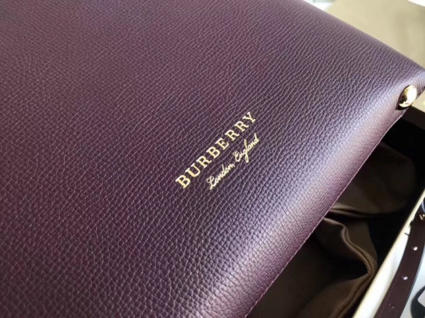 B**rry the small banner in leather and house check