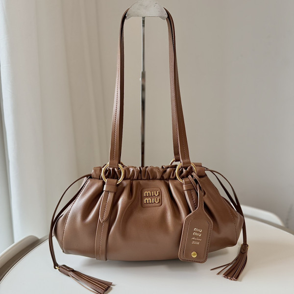 M*um*u joie nappa leather bag